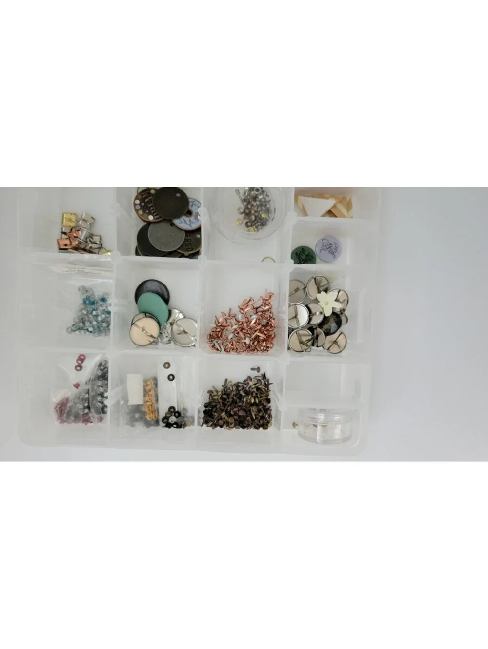 Brads and craft supplies comes with plastic storage case